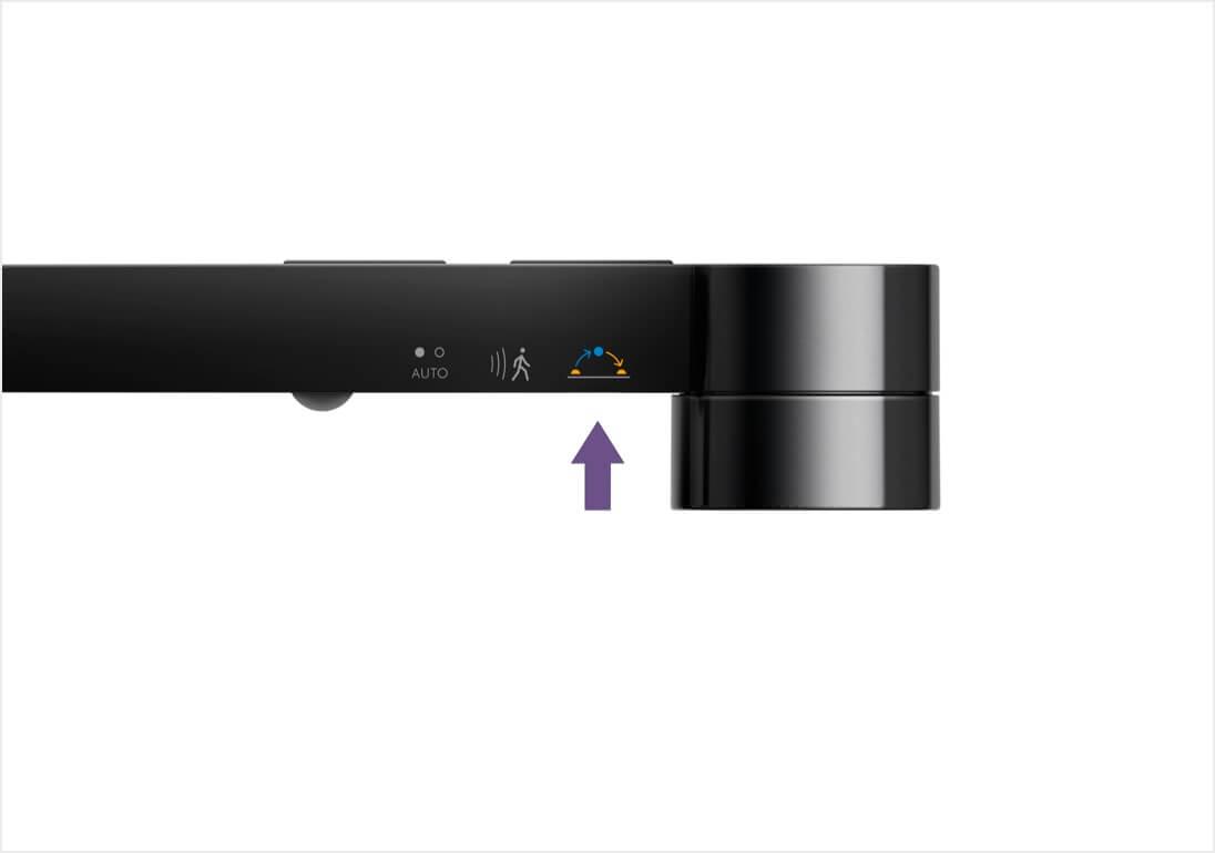 Button closest to optical head that sets light to adjust with daylight